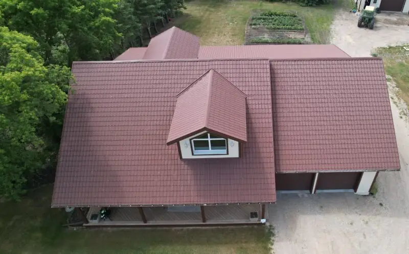 a house showing a burgundy roof